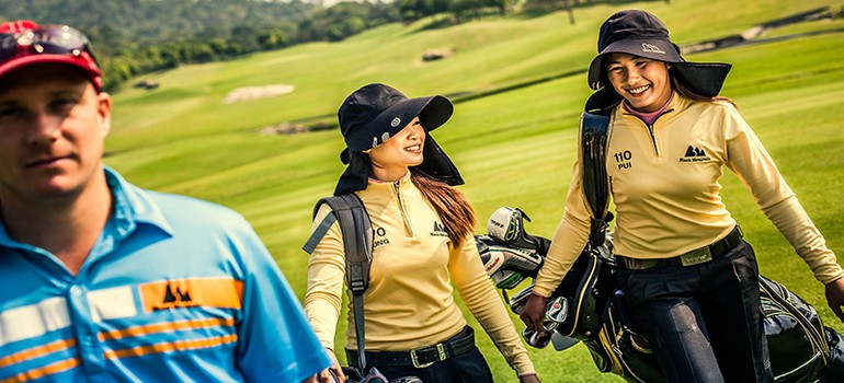 CADDIES IN GOLF COURSES, THAILAND 