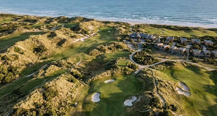 Aerial view of Barnbougle showing golf courses, dunes, accommodation and Bass Strait
