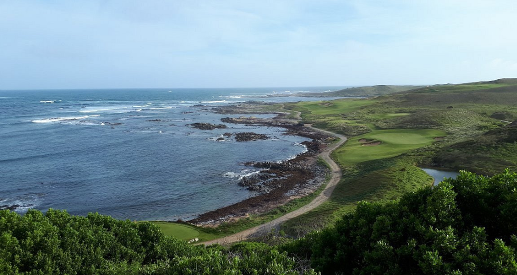 Illustrative exposed coastal links golf course with rolling dunes, sandy hollows and ocean surf for the Ocean Dunes section on King Island.